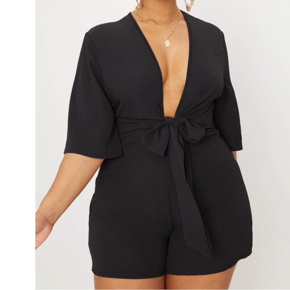 Brand New Black Romper with Deep V neck & Tie Detail